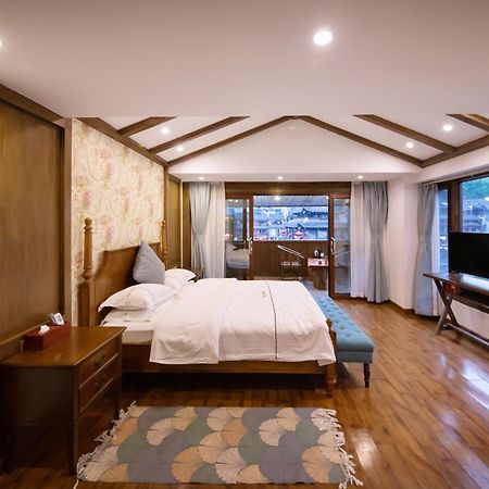 Fenghuang Slowly Time Inn Екстериор снимка